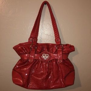 Bueno coral snakeskin purse